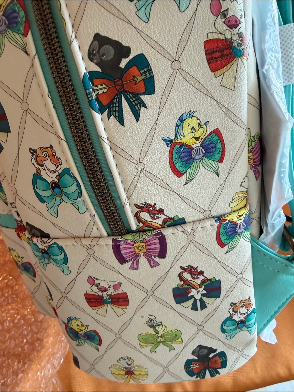 Loungefly Cream Mini Backpack with Multicolor Sidekick Bows - Picture 4 of 5